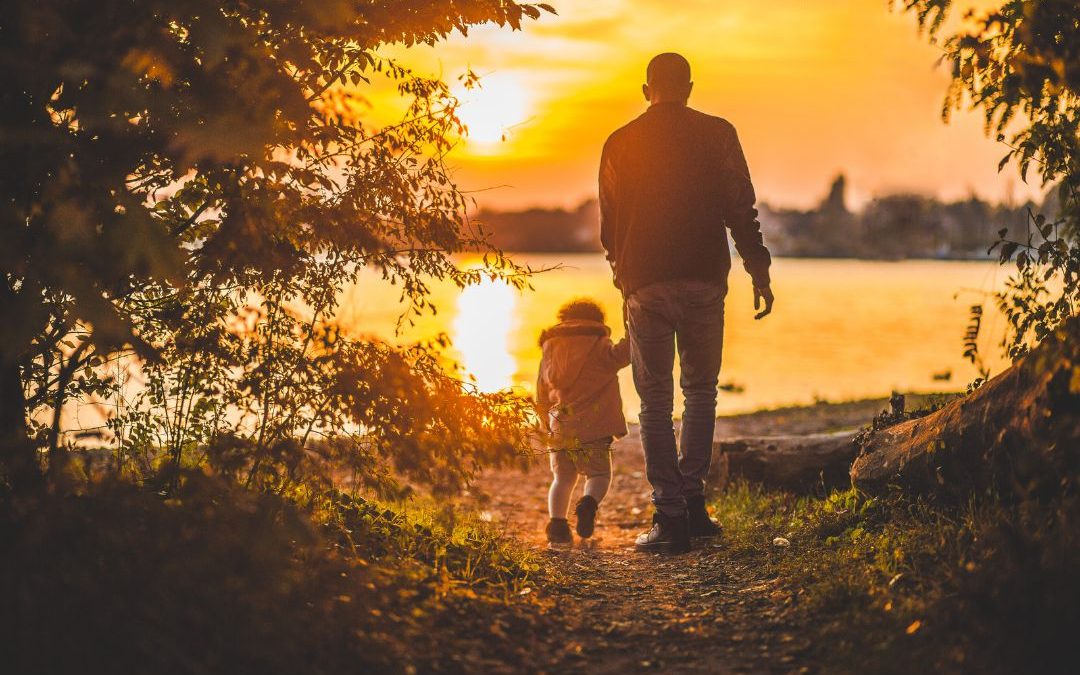 dad and child, sunset